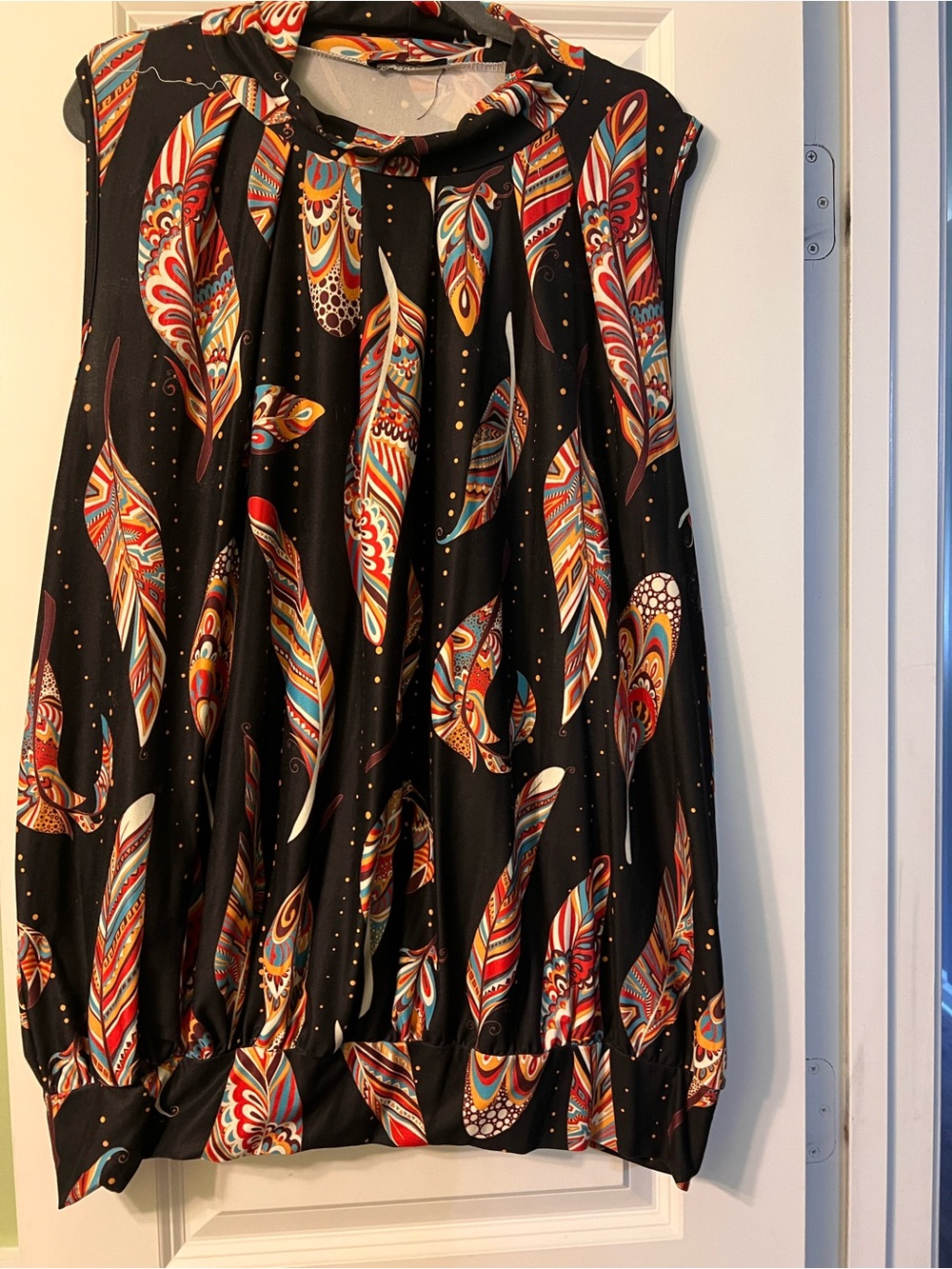 Sleeveless Black Feather-Print blouse